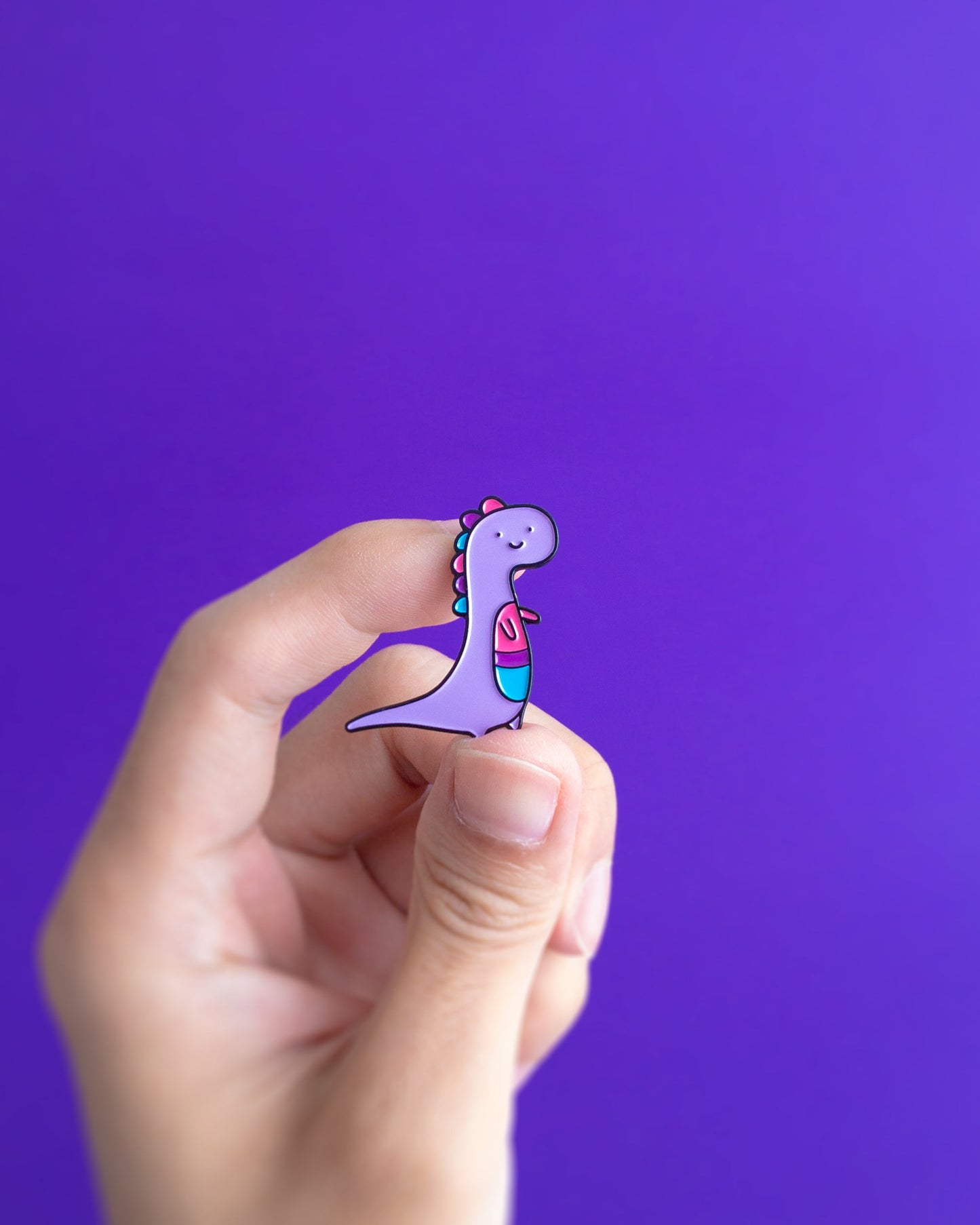 Binosaur — enamel pin