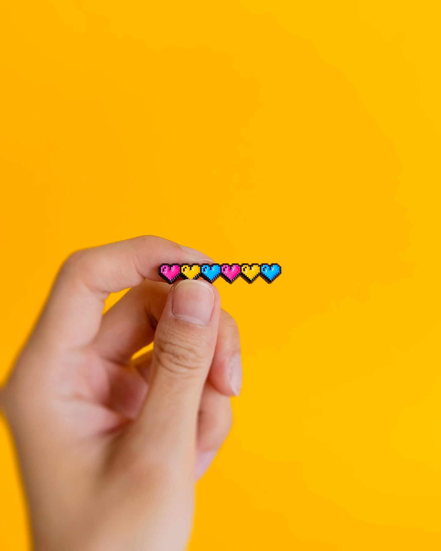 Pixel hearts (pansexual) — enamel pin