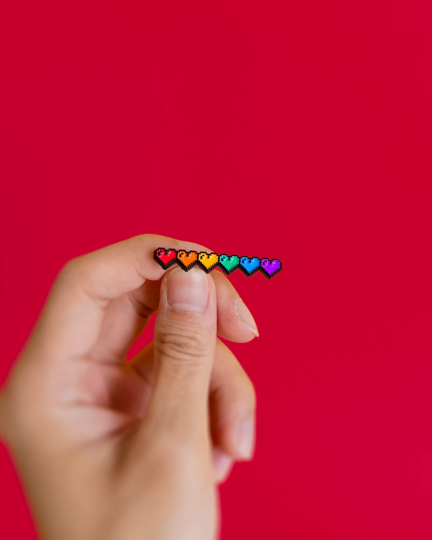 Pixel hearts (rainbow) — enamel pin
